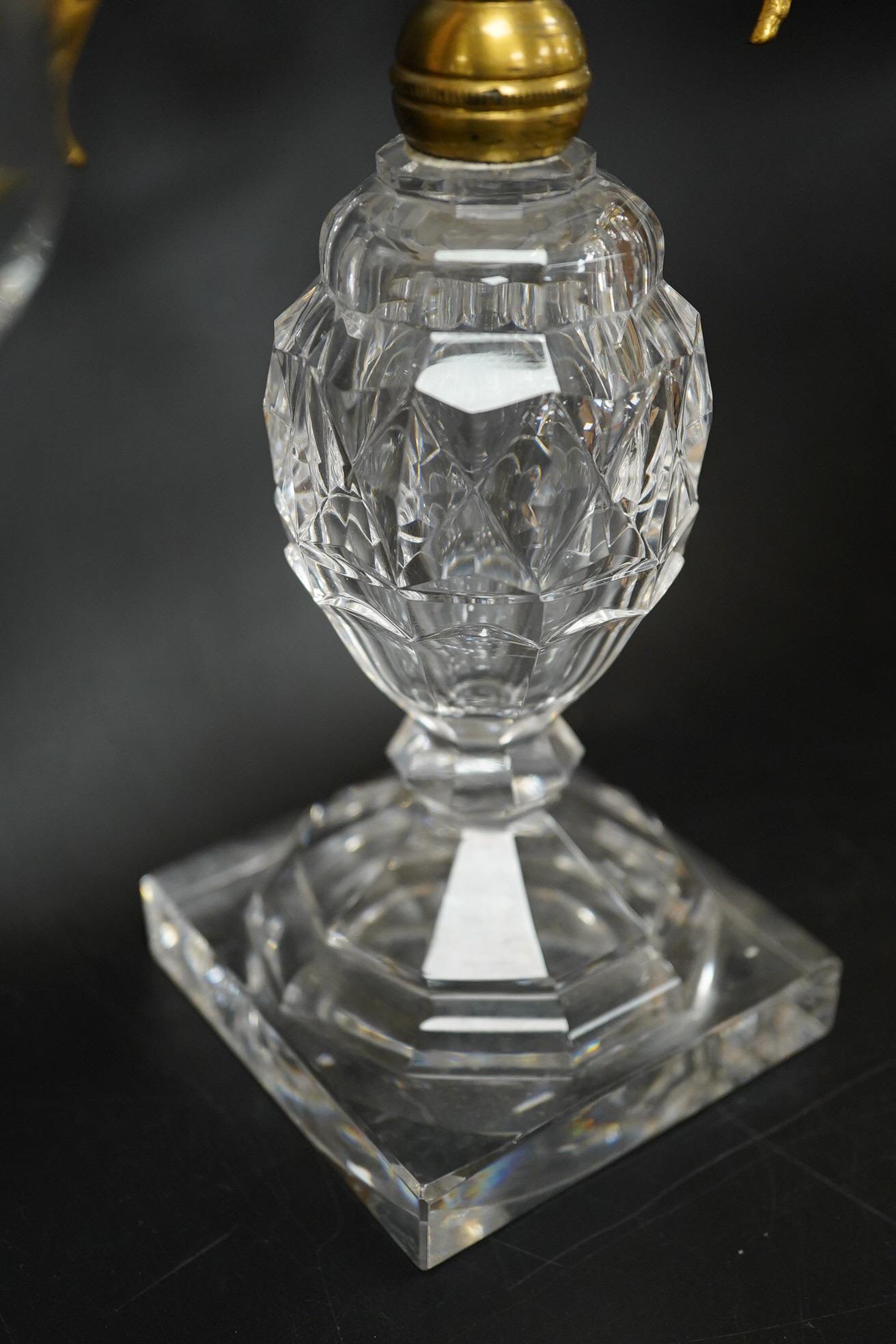 A pair of 19th century glass and gilt metal two branch candelabra with drops, 40cm high